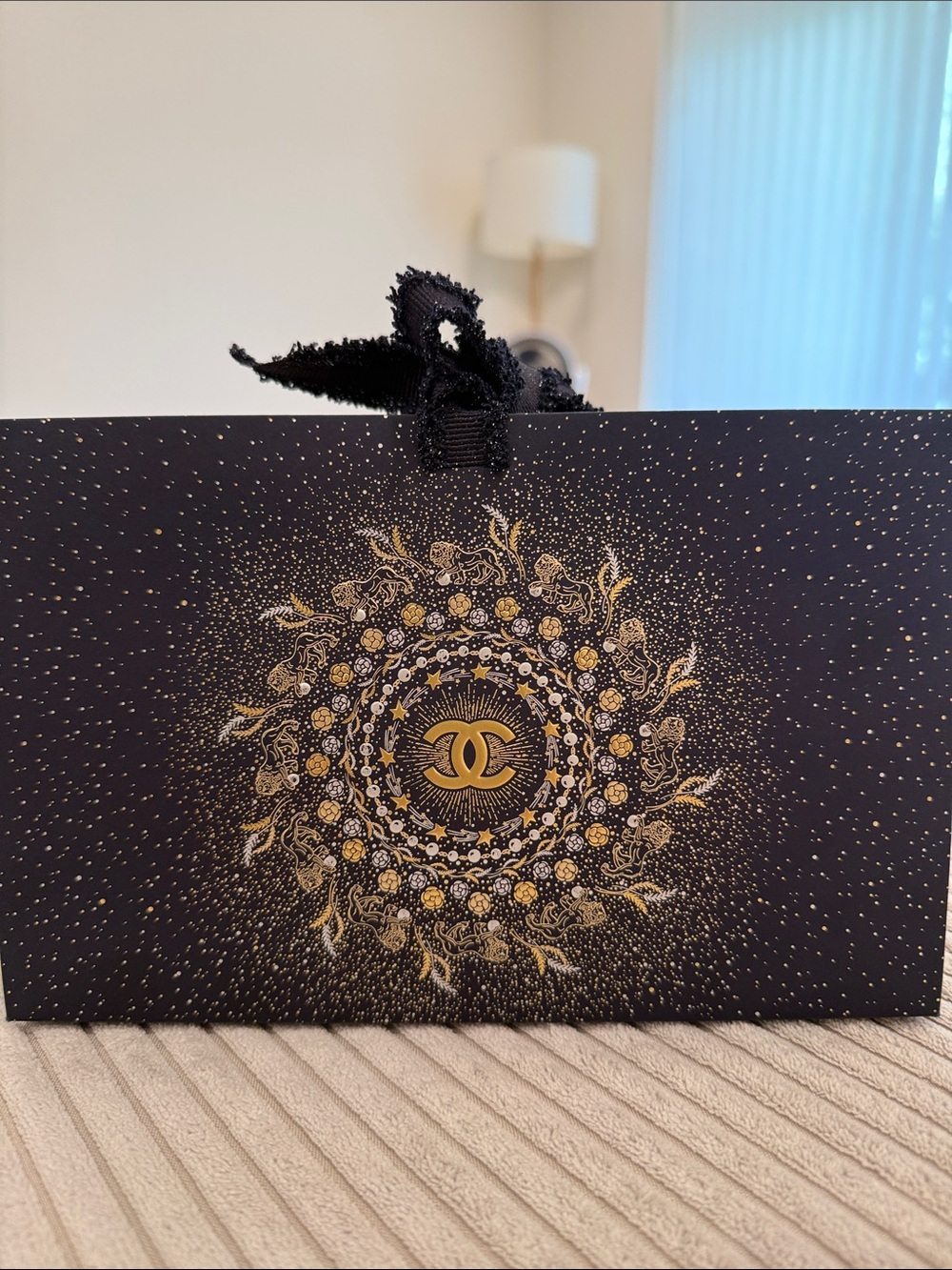 CHANEL Blue Tote with Gold Emblem Medallion paper bag